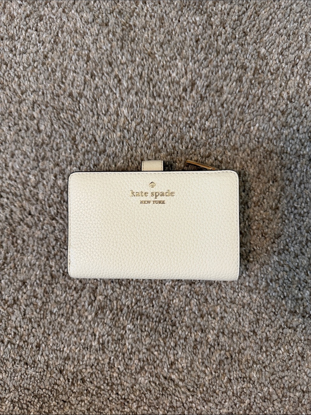 kate spade Cream Pebbled Leather Compact Wallet with Gold Logo